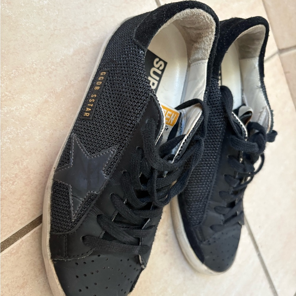 Golden Goose Black Sneakers with Gold Star Detail